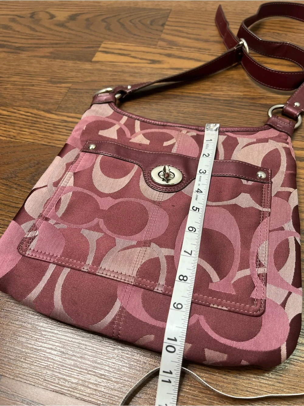 Coach Penelope Optic Signature Hippie Crossbody Bag in a purple/plum color